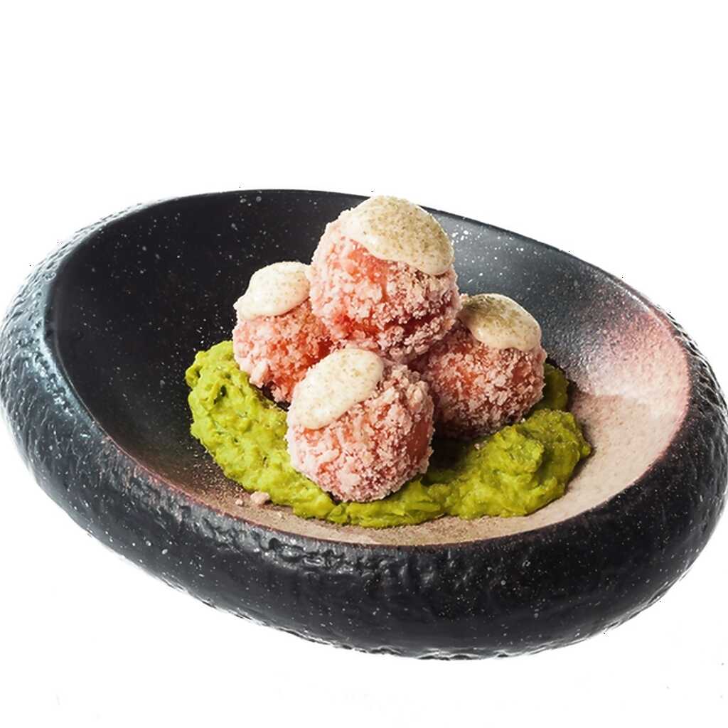 Arancini mit drei Käsesorten und grünen Erbsen
