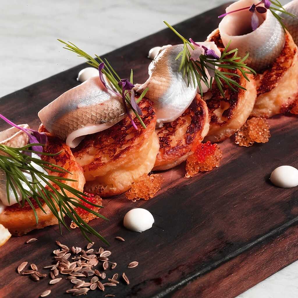 Kartoffelpfannkuchen mit eingelegtem Stint