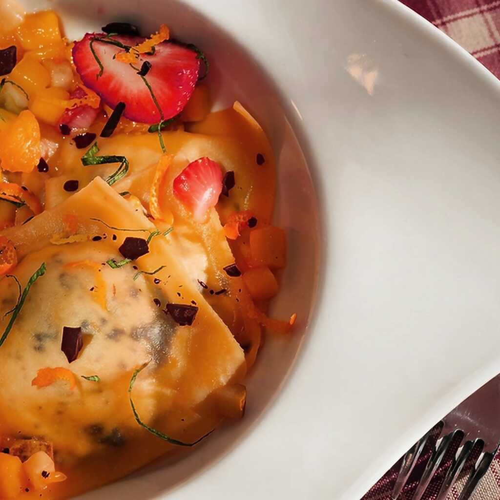 Ravioli mit Ricotta in Orangensauce mit Fruchtfrikassee