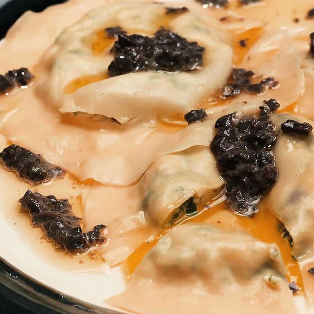 Ravioli mit Wachteleiern und Trüffelöl