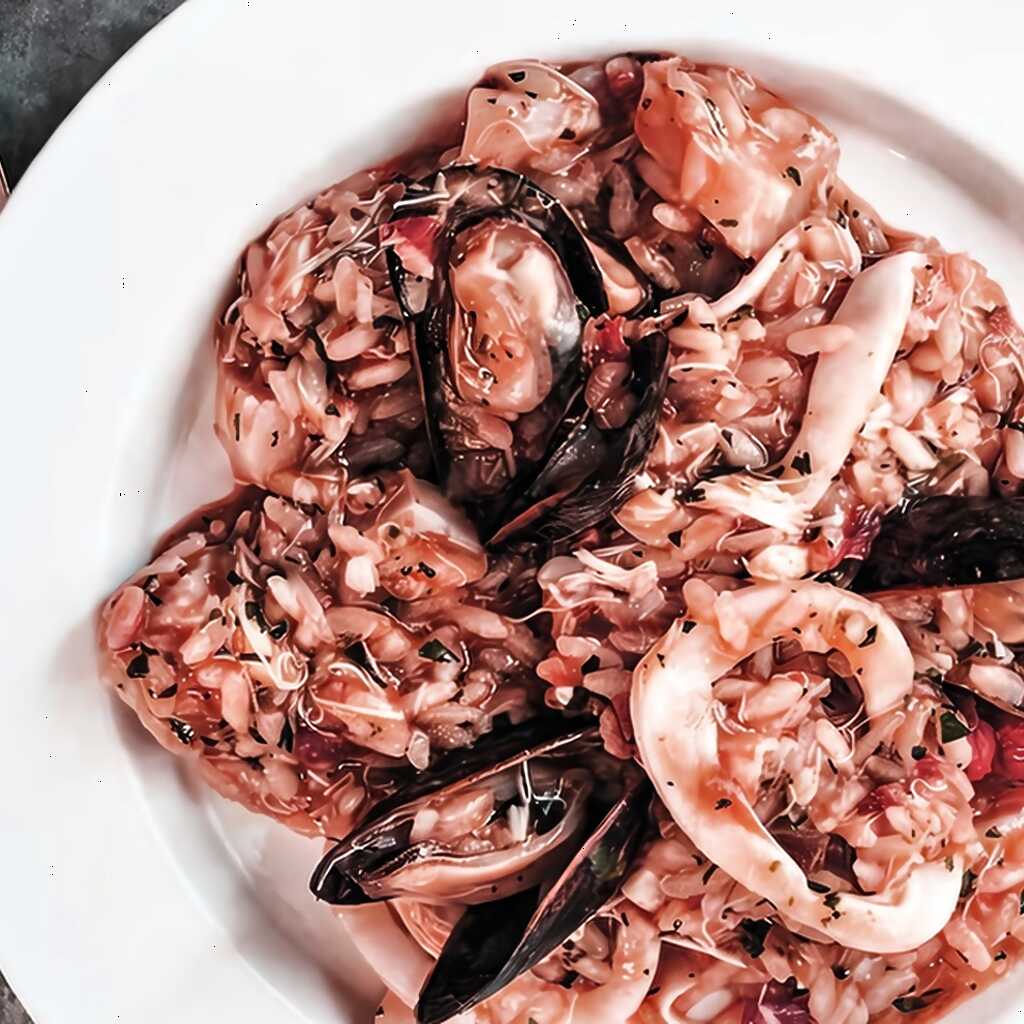 Risotto mit Meeresfrüchten und Tomaten