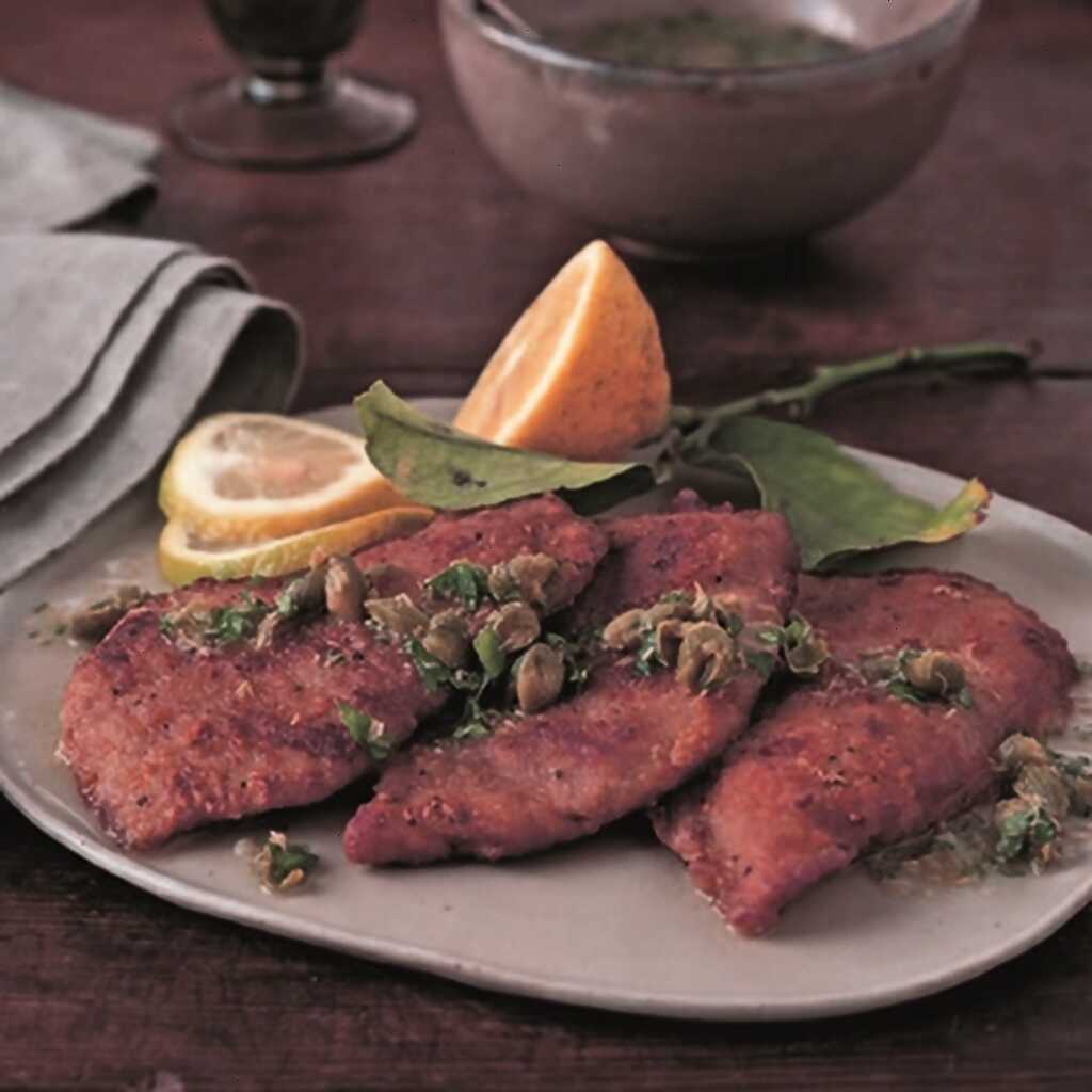Schweinekoteletts in Orangen-Senf-Sauce